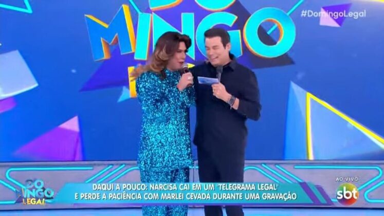 Narcisa e Portiolli no palco do Domingo Legal