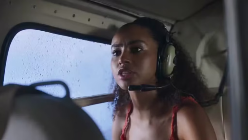 Personagem Viola, da novela Mania de Você, no helicóptero