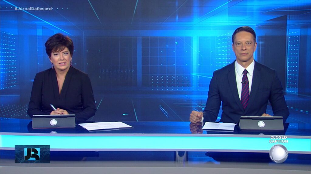 Christina Lemos e Sérgio Aguiar na bancada do Jornal da Record